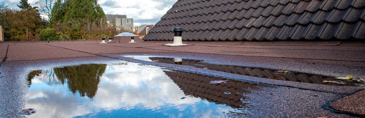 How Much Ponding Is Acceptable On A Flat Roof?
